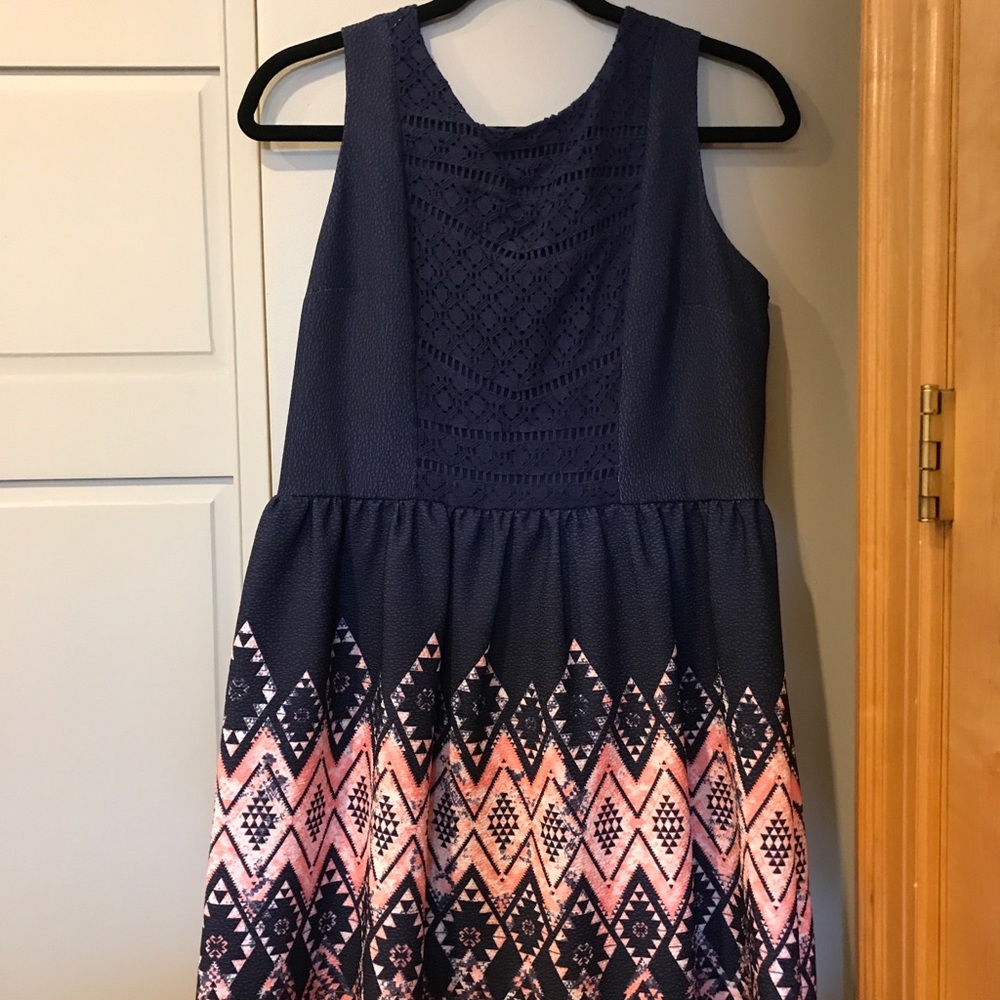 high neck eyelet dress with geometric skirt
